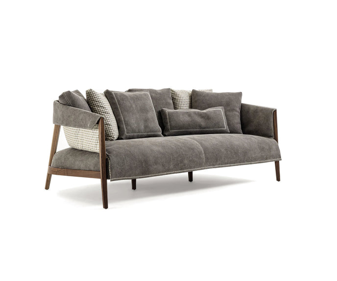 Burton Sofa by Frigerio featuring a solid ashwood frame, angled legs, and a sophisticated leather and fabric upholstery combination | Casa Design Group