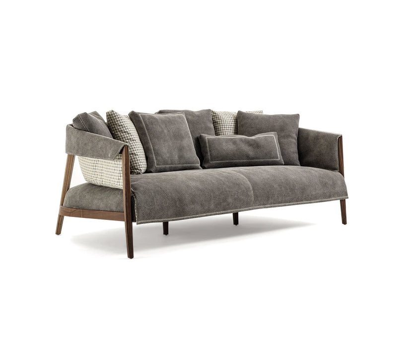 Burton Sofa by Frigerio featuring a solid ashwood frame, angled legs, and a sophisticated leather and fabric upholstery combination | Casa Design Group