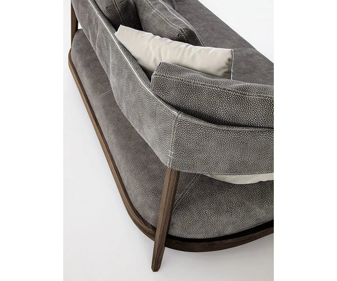 Burton Sofa by Frigerio featuring a solid ashwood frame, angled legs, and a sophisticated leather and fabric upholstery combination | Casa Design Group