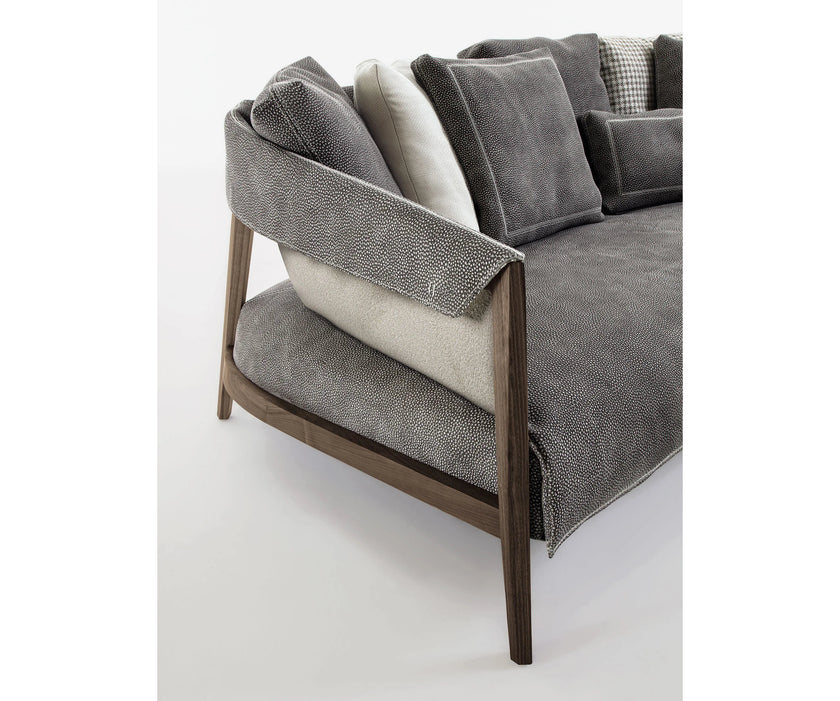 Burton Sofa by Frigerio featuring a solid ashwood frame, angled legs, and a sophisticated leather and fabric upholstery combination | Casa Design Group