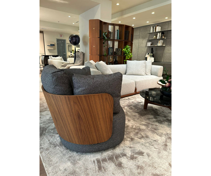 Calin Swivel Armchair by Porada with Canaletta walnut frame and upholstered seat | Casa Design Group