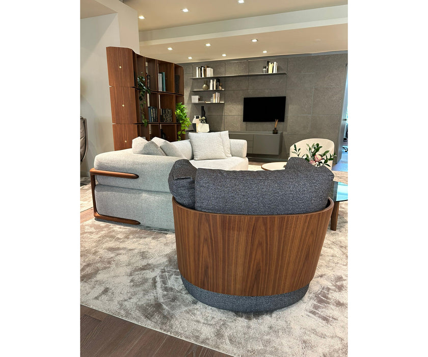 Calin Swivel Armchair by Porada with Canaletta walnut frame and upholstered seat | Casa Design Group