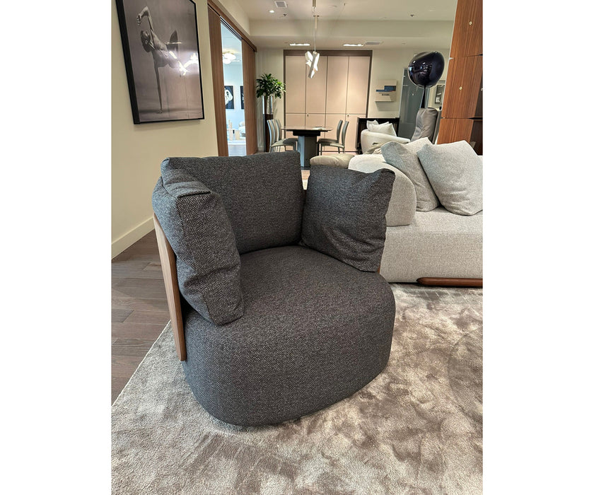 Calin Swivel Armchair by Porada with Canaletta walnut frame and upholstered seat | Casa Design Group