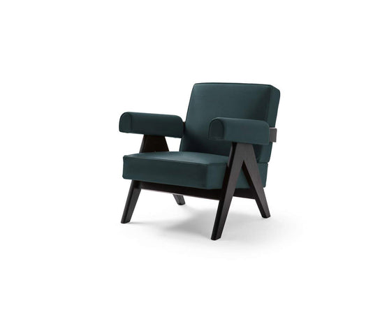 Capitol Complex Lounge Chair by Cassina inspired by Pierre Jeanneret with a solid wood frame and upholstered cushions.