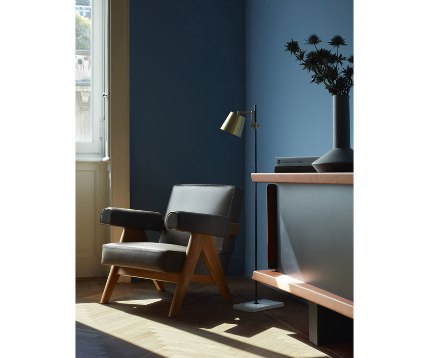 Capitol Complex Lounge Chair by Cassina inspired by Pierre Jeanneret with a solid wood frame and upholstered cushions.