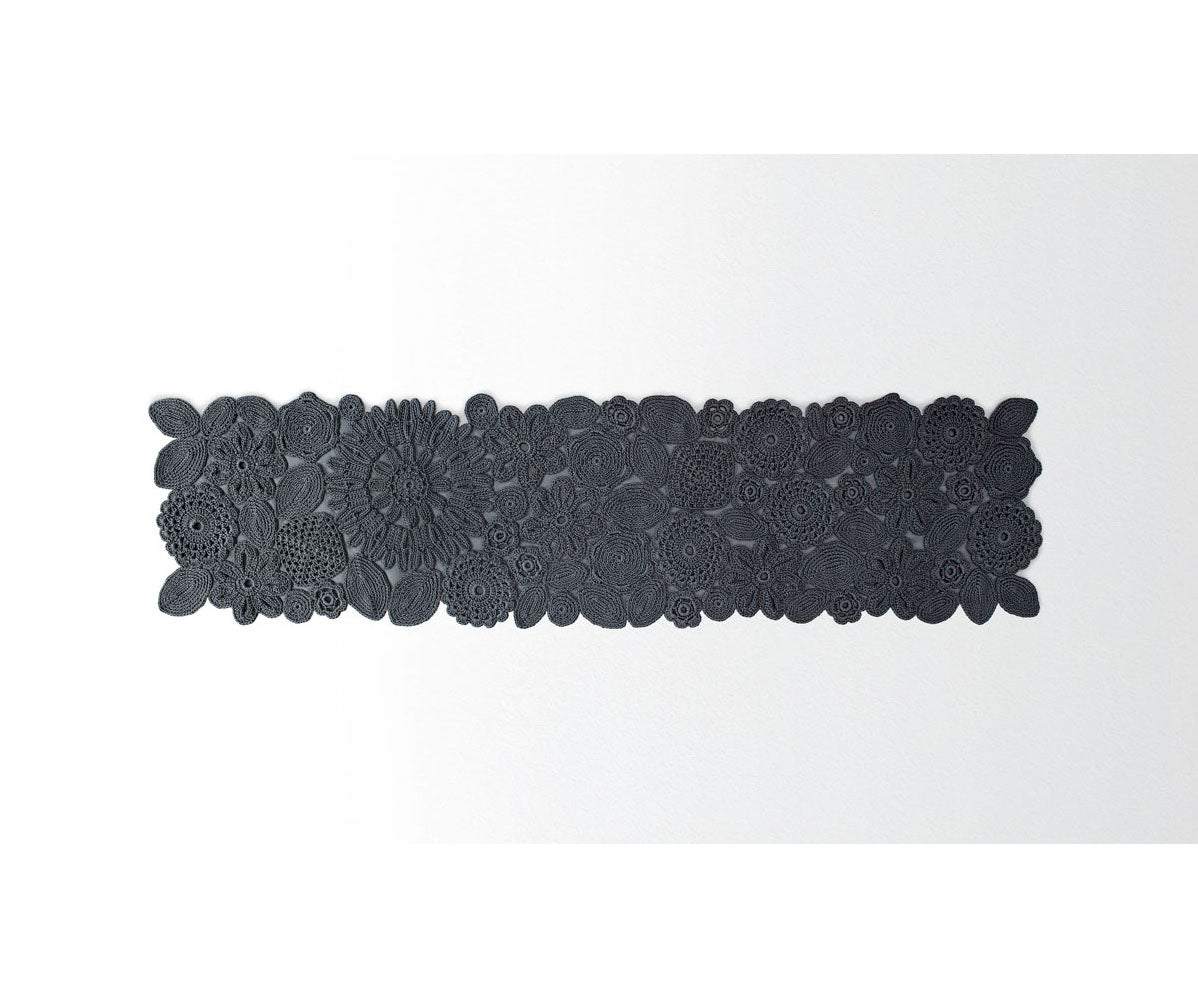 Handmade Chrocket Outdoor Rug with crocheted flowers by Paola Lenti | Casa Design Group