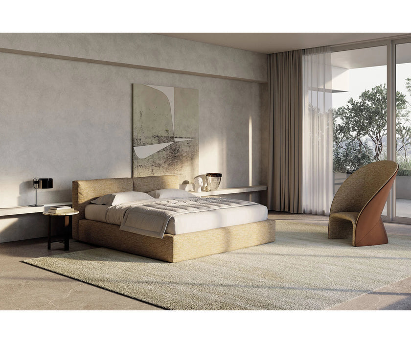 Mayu Lounge Chair by Frigerio with sculptural monoblock design, premium upholstery, and contemporary Italian craftsmanship | Casa Design Group