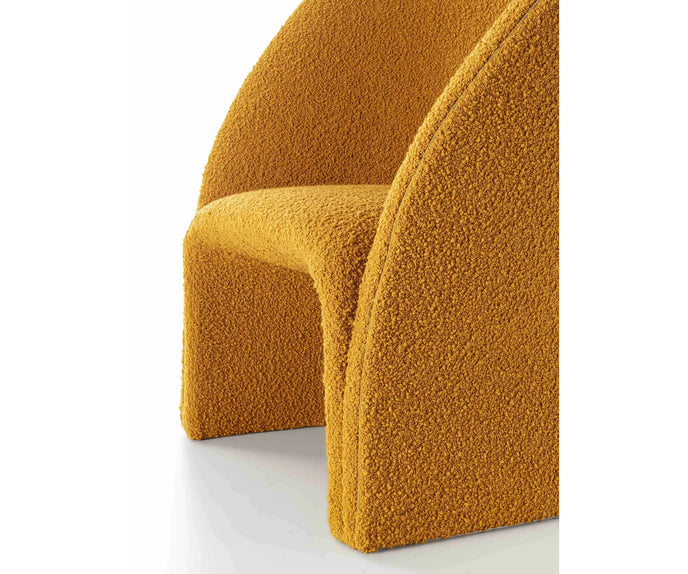 Mayu Lounge Chair by Frigerio with sculptural monoblock design, premium upholstery, and contemporary Italian craftsmanship | Casa Design Group