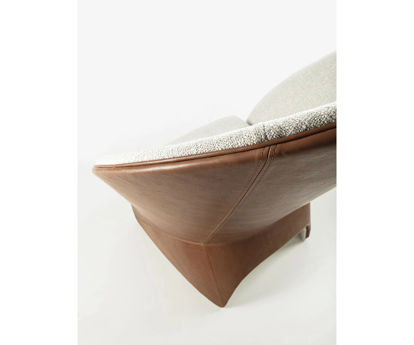 Mayu Lounge Chair by Frigerio with sculptural monoblock design, premium upholstery, and contemporary Italian craftsmanship | Casa Design Group
