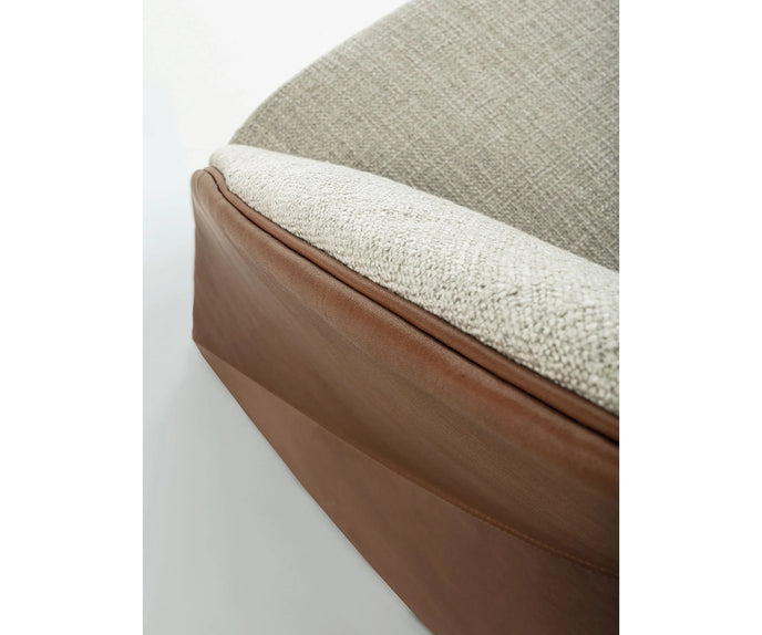 Mayu Lounge Chair by Frigerio with sculptural monoblock design, premium upholstery, and contemporary Italian craftsmanship | Casa Design Group