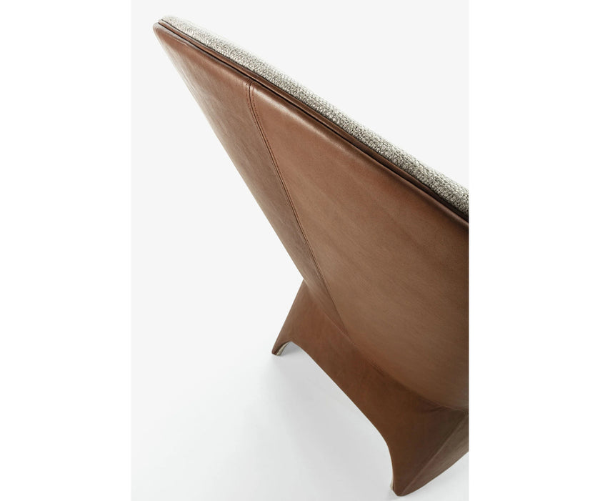 Mayu Lounge Chair by Frigerio with sculptural monoblock design, premium upholstery, and contemporary Italian craftsmanship | Casa Design Group