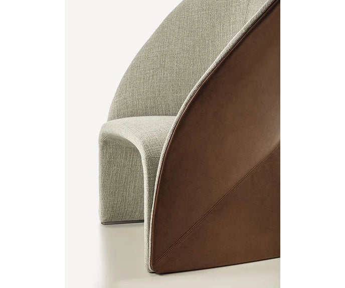 Mayu Lounge Chair by Frigerio with sculptural monoblock design, premium upholstery, and contemporary Italian craftsmanship | Casa Design Group