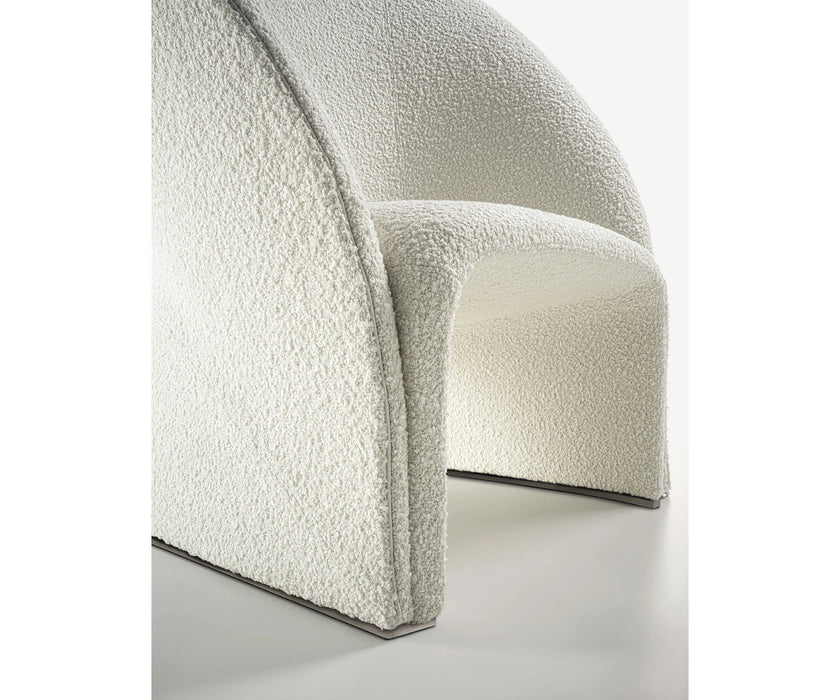 Mayu Lounge Chair by Frigerio with sculptural monoblock design, premium upholstery, and contemporary Italian craftsmanship | Casa Design Group