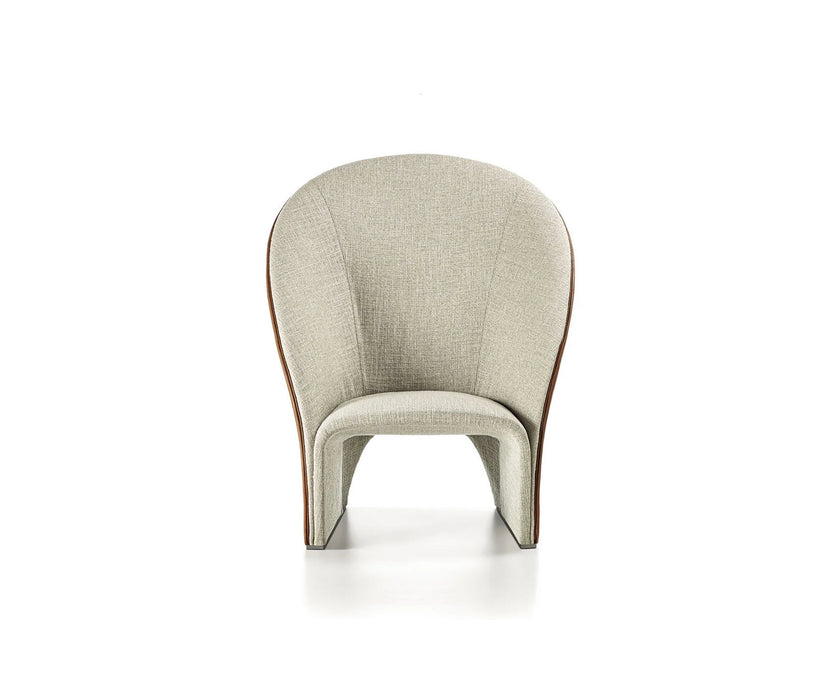 Mayu Lounge Chair by Frigerio with sculptural monoblock design, premium upholstery, and contemporary Italian craftsmanship | Casa Design Group