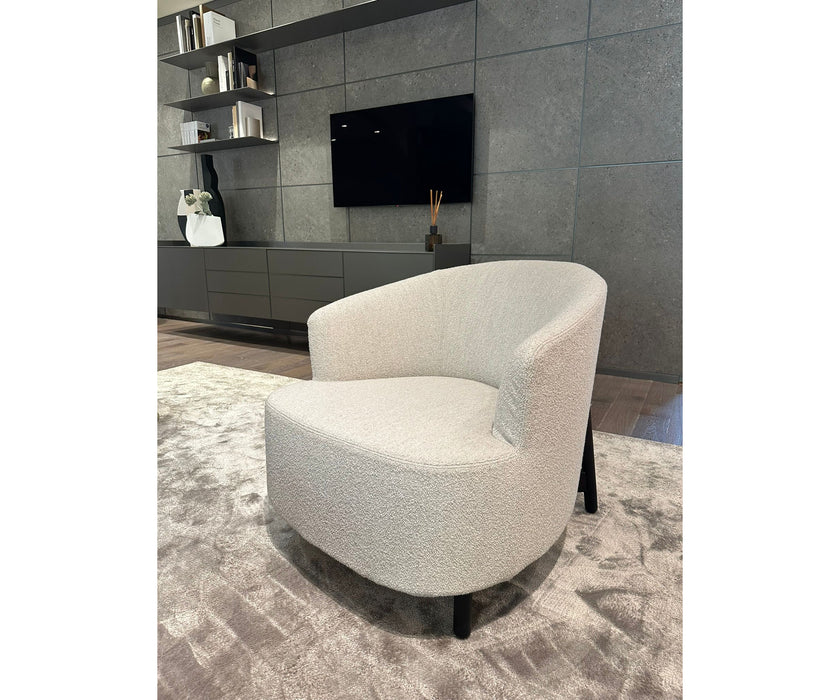 Copine Lounge Chair by Porada with soft upholstered silhouette and refined Italian craftsmanship | Casa Design Group
