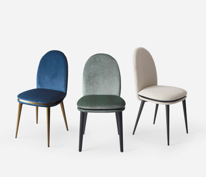 Cremino Dining Chair with rounded upholstered backrest, slender tapered legs and decorative metal ring by Accento | Casa Design Group