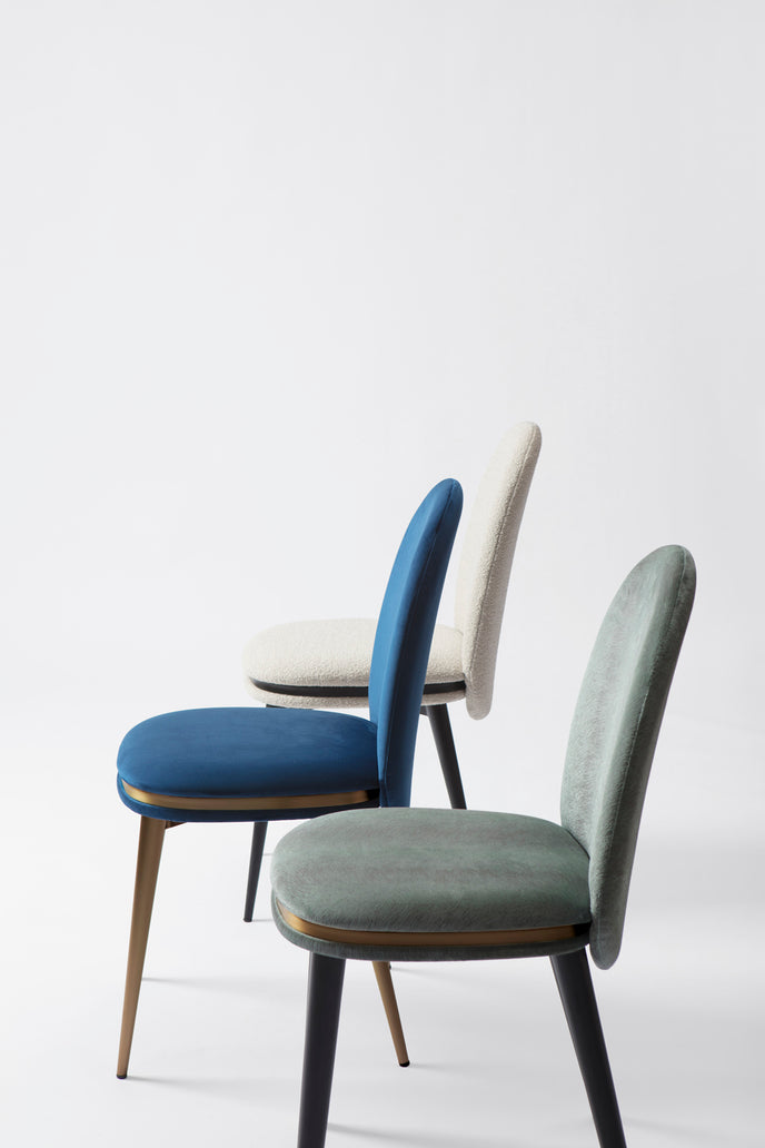 Cremino Dining Chair with rounded upholstered backrest, slender tapered legs and decorative metal ring by Accento | Casa Design Group