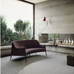 Jackie Bergère Sofa by Frigerio featuring a curved silhouette, sculpted armrests, and a high enveloping backrest | Casa Design Group