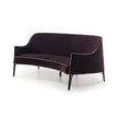 Jackie Bergère Sofa by Frigerio featuring a curved silhouette, sculpted armrests, and a high enveloping backrest | Casa Design Group