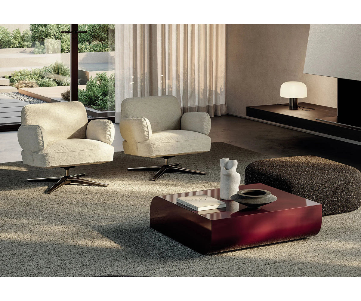 Contemporary Dafne lounge chair by Frigerio with sculptural upholstered design