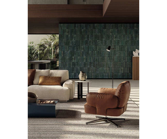 Contemporary Dafne lounge chair by Frigerio with sculptural upholstered design
