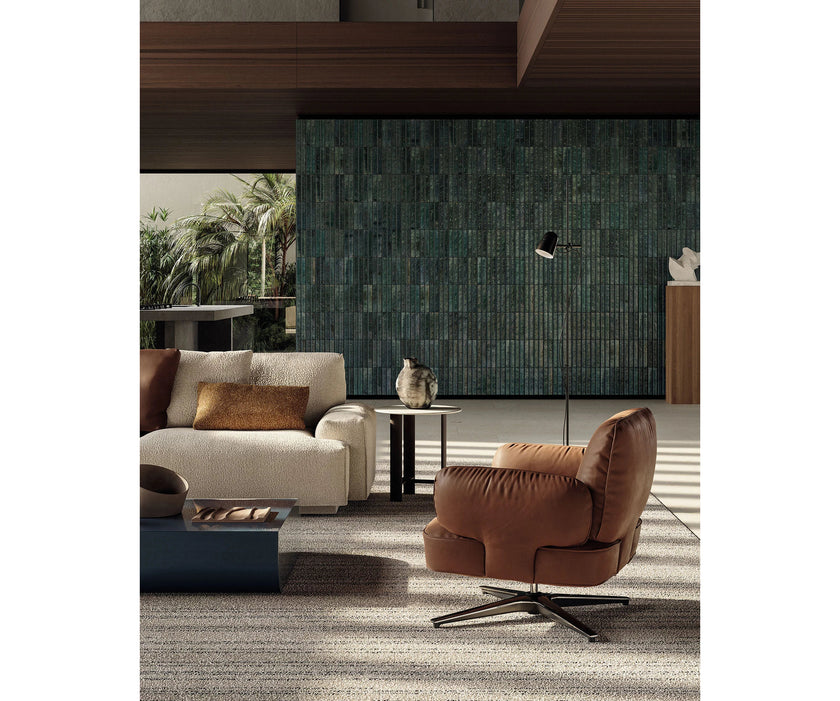 Contemporary Dafne lounge chair by Frigerio with sculptural upholstered design