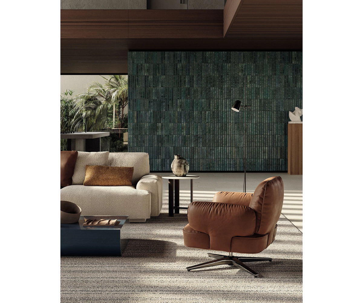 Contemporary Dafne lounge chair by Frigerio with sculptural upholstered design