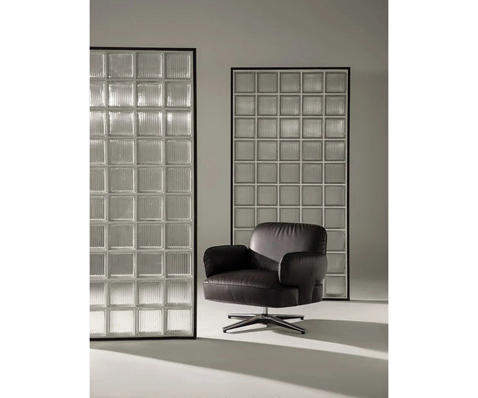 Contemporary Dafne lounge chair by Frigerio with sculptural upholstered design