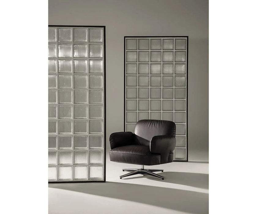 Contemporary Dafne lounge chair by Frigerio with sculptural upholstered design