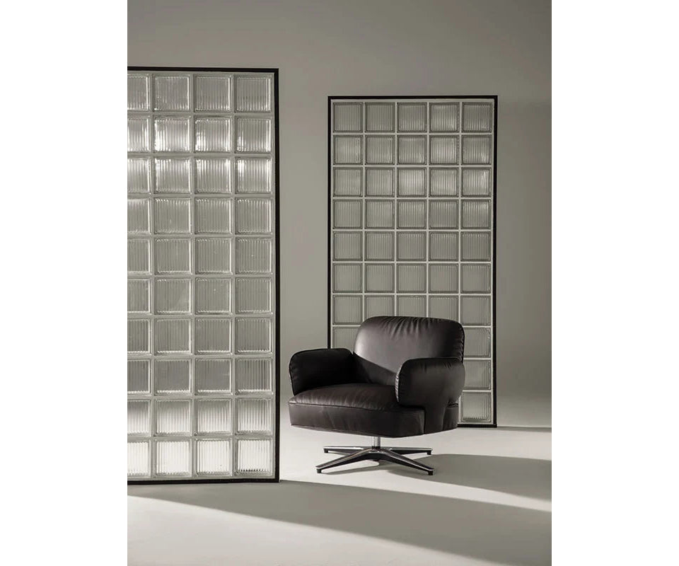 Contemporary Dafne lounge chair by Frigerio with sculptural upholstered design