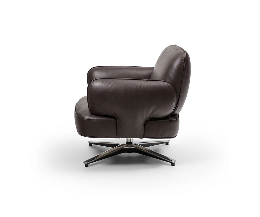 Contemporary Dafne lounge chair by Frigerio with sculptural upholstered design