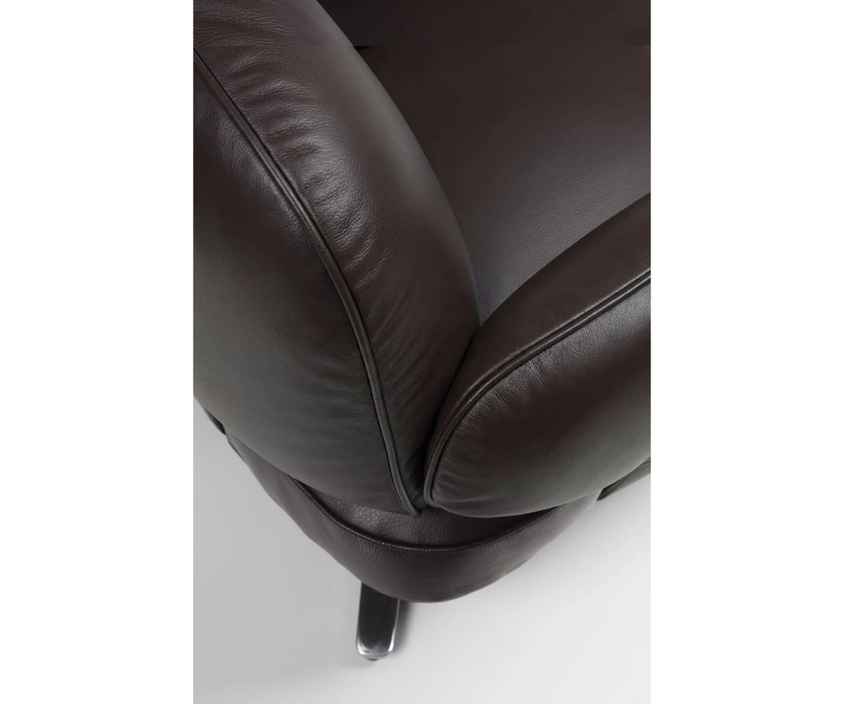 Contemporary Dafne lounge chair by Frigerio with sculptural upholstered design