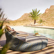 Dala Loveseat by Dedon – handwoven outdoor sofa for two | Casa Design Group