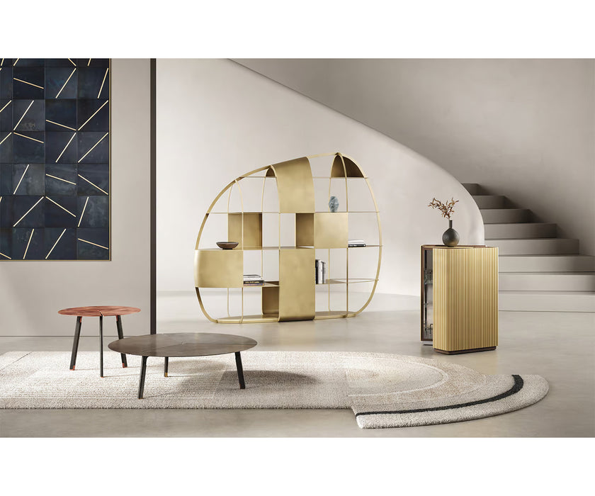 Airframe Bookcase by De Castelli in Brushed Brass with Sculptural Hammered Metal Design | Casa Design Group