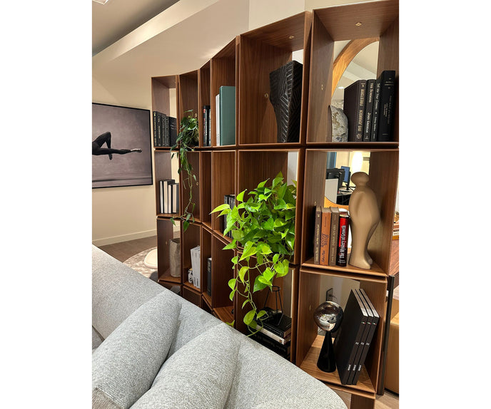 Demetra Bookcase by Porada in Canaletta walnut with brushed brass details and modular design | Casa Design Group