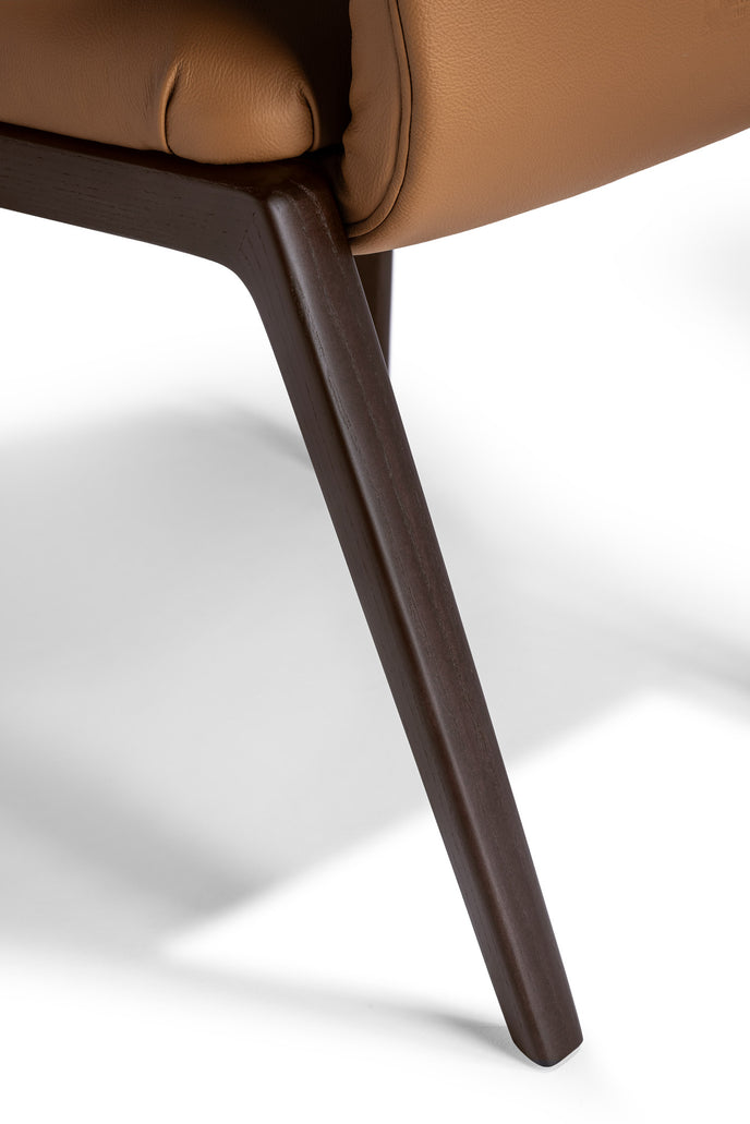DUO Dining Chair with a high upholstered backrest, solid ash wood legs and tailored leather or fabric upholstery by Ceccotti Collezioni | Casa Design Group