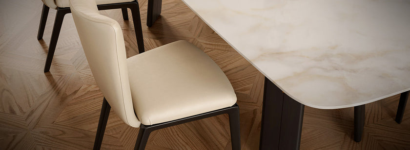 DUO Dining Chair with a high upholstered backrest, solid ash wood legs and tailored leather or fabric upholstery by Ceccotti Collezioni | Casa Design Group