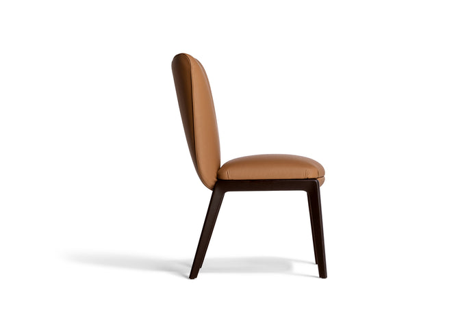 DUO Dining Chair with a high upholstered backrest, solid ash wood legs and tailored leather or fabric upholstery by Ceccotti Collezioni | Casa Design Group