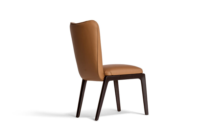 DUO Dining Chair with a high upholstered backrest, solid ash wood legs and tailored leather or fabric upholstery by Ceccotti Collezioni | Casa Design Group