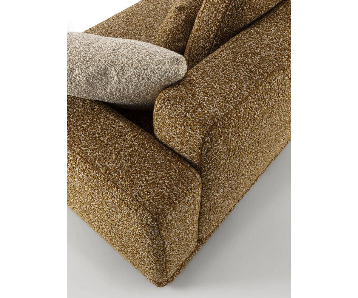 Eddie Sofa by Frigerio modular designer sofa with upholstered seating and concealed base | Casa Design Group