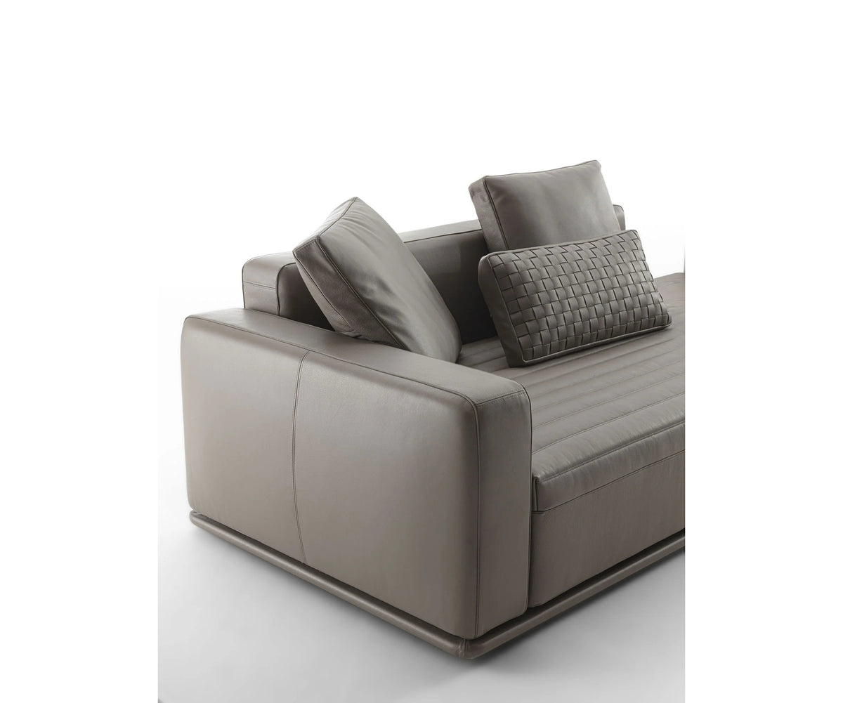 Eddie Sofa by Frigerio modular designer sofa with upholstered seating and concealed base | Casa Design Group