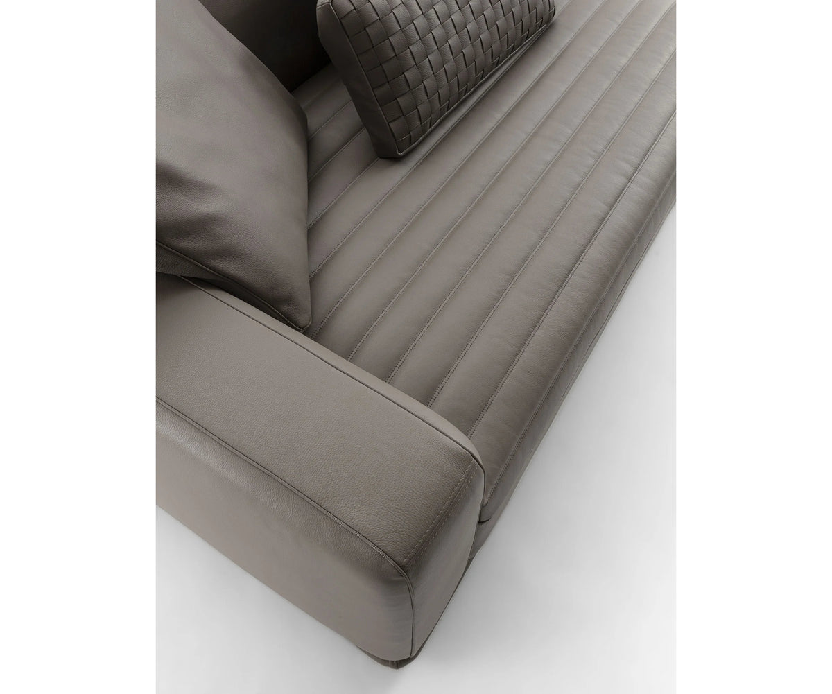 Eddie Sofa by Frigerio modular designer sofa with upholstered seating and concealed base | Casa Design Group
