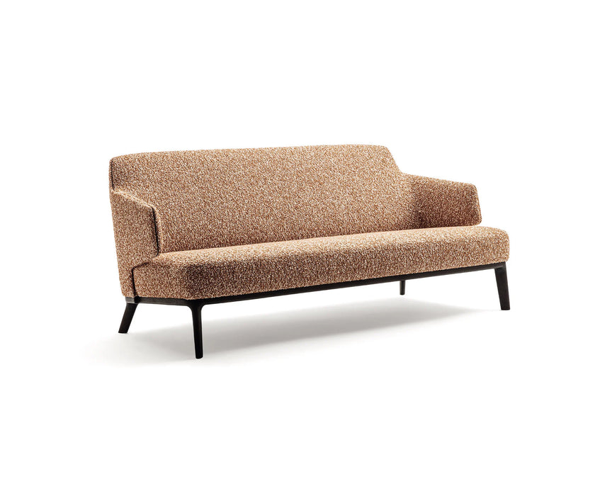 Amanda Sofa by Frigerio with enveloping armrests, ashwood base, and refined Italian design | Casa Design Group
