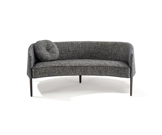 Jackie Sofa by Frigerio featuring a curved silhouette, sculpted armrests, and refined Italian craftsmanship | Casa Design Group
