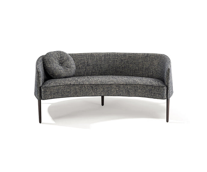Jackie Sofa by Frigerio featuring a curved silhouette, sculpted armrests, and refined Italian craftsmanship | Casa Design Group