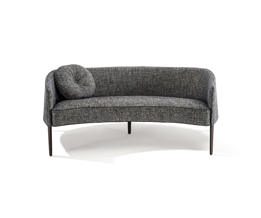 Jackie Sofa by Frigerio featuring a curved silhouette, sculpted armrests, and refined Italian craftsmanship | Casa Design Group