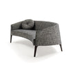 Jackie Sofa by Frigerio featuring a curved silhouette, sculpted armrests, and refined Italian craftsmanship | Casa Design Group