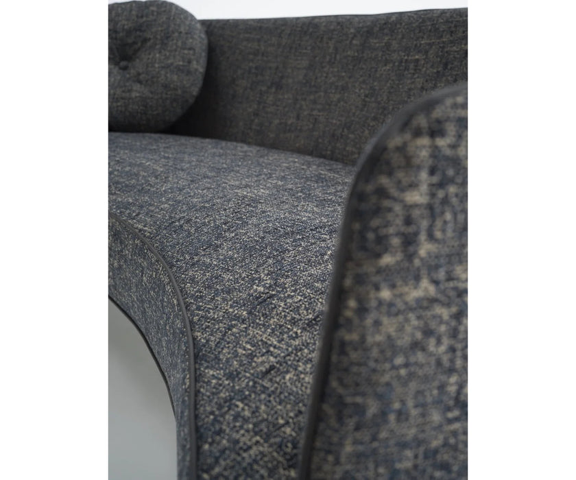Jackie Sofa by Frigerio featuring a curved silhouette, sculpted armrests, and refined Italian craftsmanship | Casa Design Group