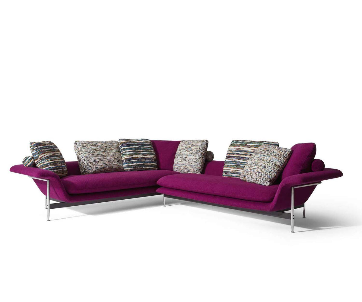 Esosoft sectional sofa by Cassina with modular design, aluminum frame and upholstered cushions – Casa Design Group
