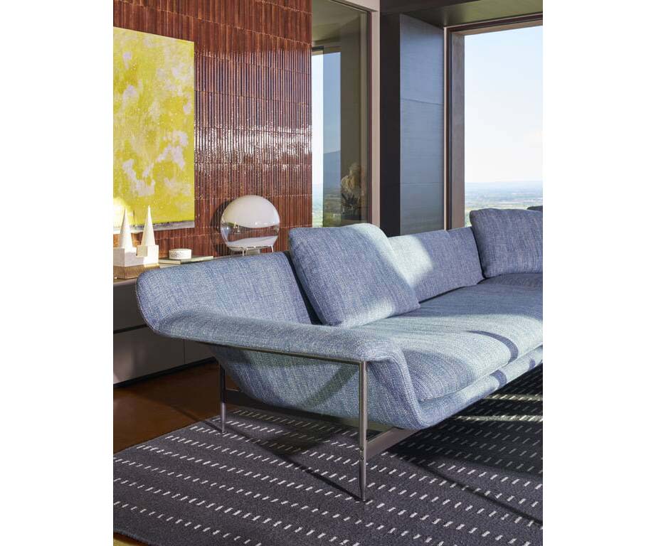 Esosoft sofa by Cassina with modular design, aluminum frame and upholstered cushions – Casa Design Group